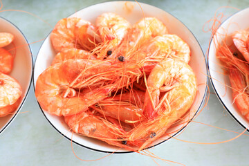 Dried shrimps are on a porcelain plate in a restaurant, North China