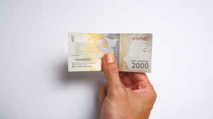 Indonesian Rupiah the official currency of Indonesia. Business and finance concept, Uang 2000 Rupiah, Bank Indonesia