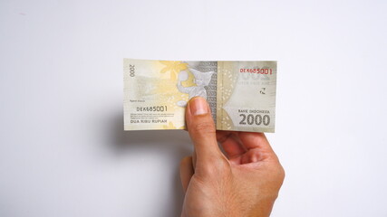 Indonesian Rupiah the official currency of Indonesia. Business and finance concept, Uang 2000...