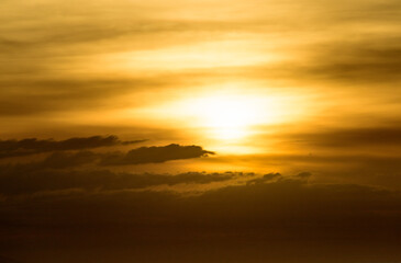 Beautiful sunset with glistening seas and romantic clouds. 