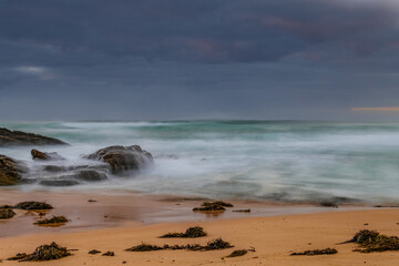 Rocks and waves - sunrise seascape at Bermagui