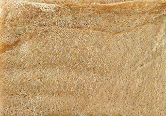 fried flour sheet texture background, traditional dessert of thai south, used for offerings to the monks at the Bun Festival ten months, in Thai called Khanom La