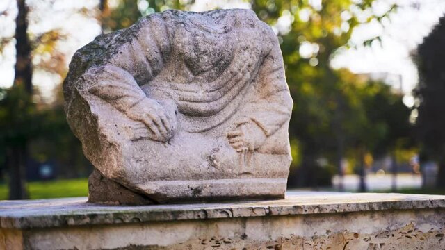 Headless, carved stone from the Roman Empire period, Constanta, Romania