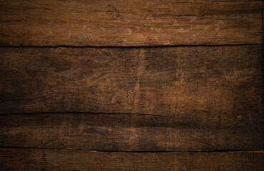 The texture of very old boards. Wooden wall in the house. Vintage wood background.