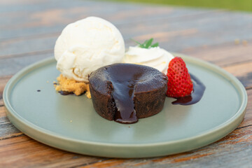 chocolate lava with vanilla ice-cream and whipping cream