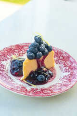 blueberry cheese cake on plate