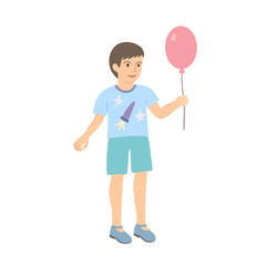Smiling young boy with pink ballon in hand isolated on white background.