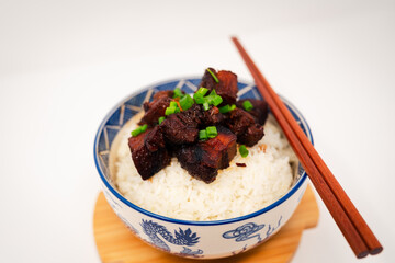 Process of Cooking Chinese Roast Pork Over Rice