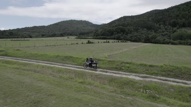 video with drone following a motorcycle off road