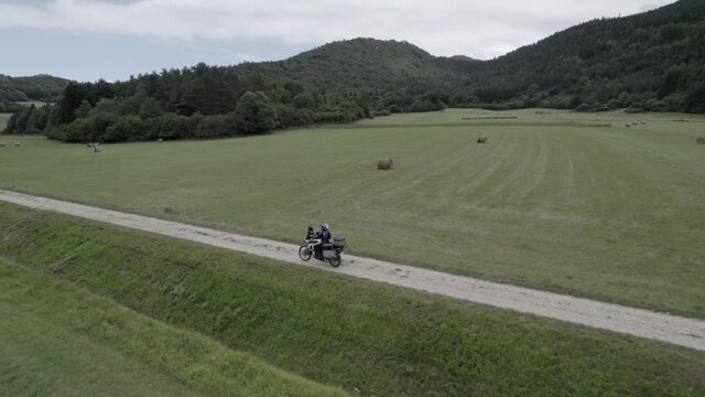 video with drone following a motorcycle off road