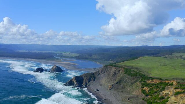 lagos view and Clouds topocalma beach, stone of the wind litueche puertecillo matanzas windsurfing spot surfing spot. CHile drone shot