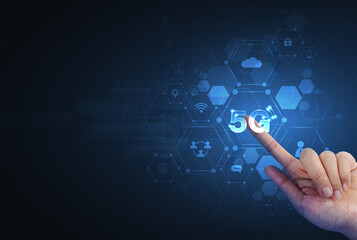 Hand pointing 5G network wireless systems and internet of things with man touching with wireless high-speed Internet communication network background