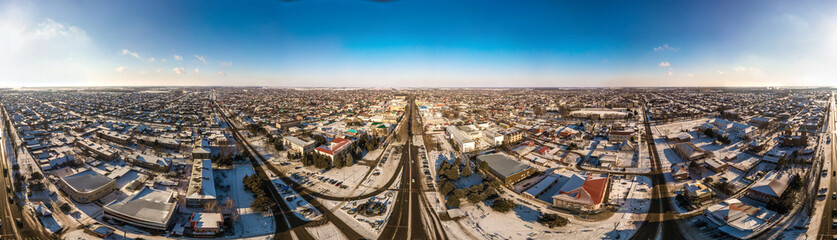 Fototapeta na wymiar winter panoramic landscape of Korenovsk city center (South of Russia) - low-rise buildings