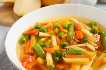 Bowl of delicious turnip soup, closeup view