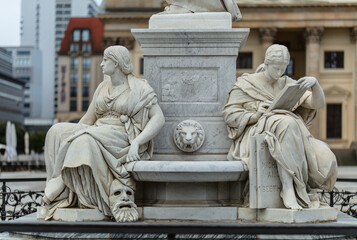 Sculptures at the Gendarmenmarkt in the Mitte district. Berlin, Germany.