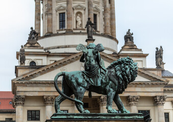 Obraz premium Sculptures at the Gendarmenmarkt in the Mitte district. Berlin, Germany.