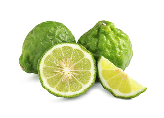 Whole and cut ripe bergamot fruits on white background