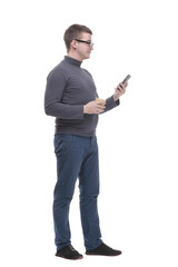casual young man with smartphone and takeaway coffee.