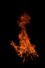 Fire flames isolated on black background. Fire burn flame isolated, flaming burning art design concept with space for text.