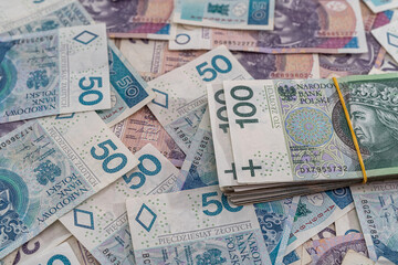 Fototapeta na wymiar Zl as money of Poland, zloty pile of banknotes. different bills