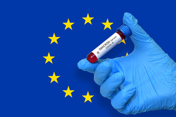 Doctor holds blood test tube for the detection of the Omicron variant of the Covid-19 virus with a...