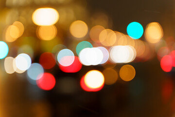 Night street lights. Blurred cars, transport and taxis and traffic on the evening city road with...