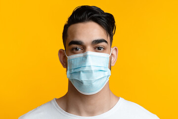 Closeup portrait of arab guy with face mask