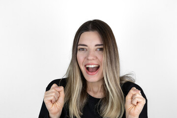 Happy blonde young woman saying thank you, express gratitude, holding hands together in namaste sign and looking thankful at camera, white background.