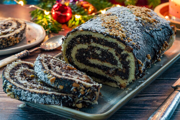 Makowiec - traditional Polish Christmas poppy seed cake with nuts and raisins