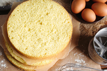 Sponge Cake Layers, Sponge cake, shortcakes on baking grid, text space, selective focus, close up.