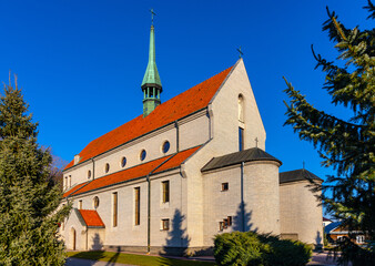 Neo-gothic parish church of St. Peter and Paul Apostles Upper Zagorzyce Gorne village in Podkarpacie region of Lesser Poland - obrazy, fototapety, plakaty