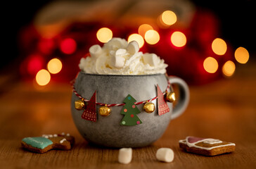 Hot winter drink with Christmas decoration and candy