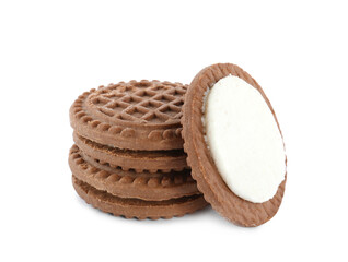 Tasty chocolate sandwich cookies with cream on white background