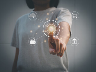 Young woman using fingerprint scanning technology to provide security in the digital world with digital care safety technology.