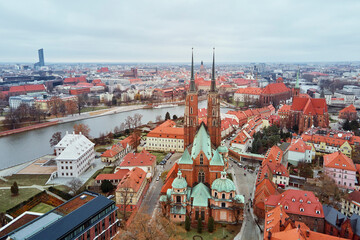 Naklejka na ściany i meble Aerial view of Wroclaw cityscape panorama in Poland. Cathedral of St. John on Tumski island, bird eye view