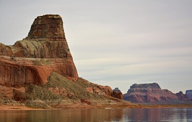 castle rock and red rock formations, near warm creek bay as seen from a   boat on  lake powell, near page,  arizona    