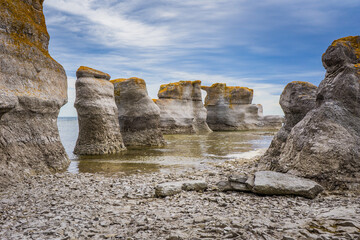 Obraz premium View on the famous monoliths of Quarry Island, in Mingan Archipelago National Park, in Cote Nord region of Quebec, Canada