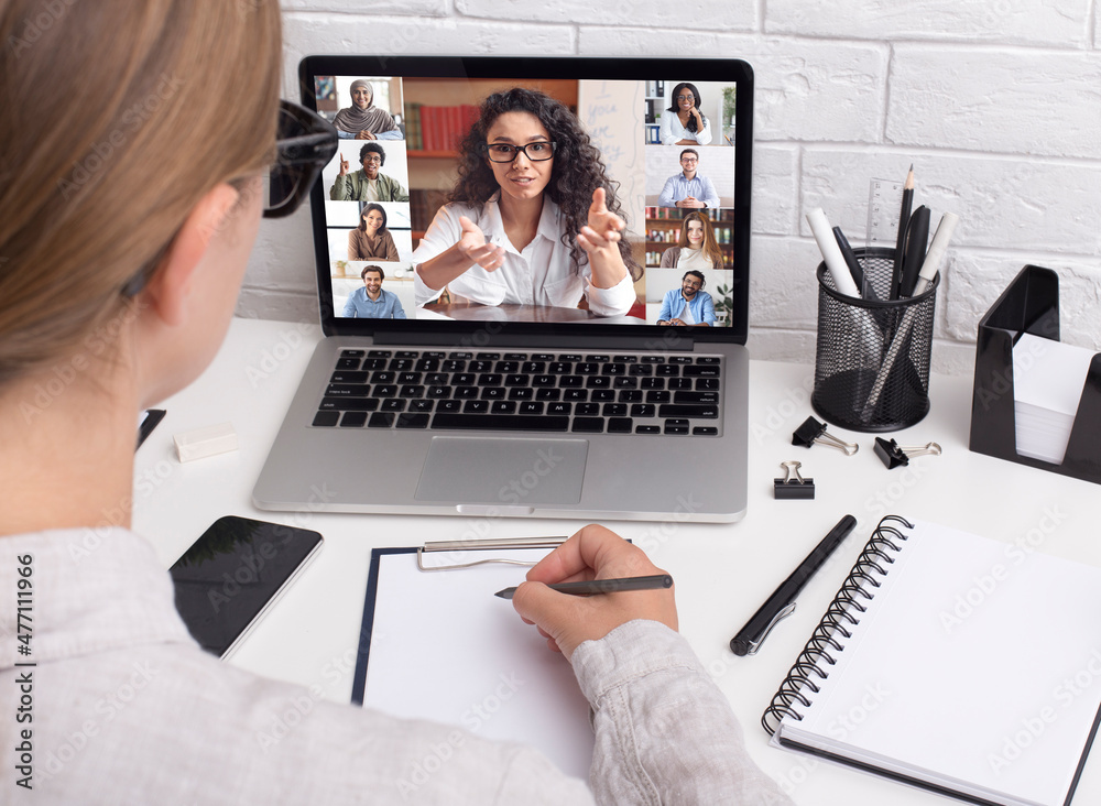 Wall mural Business Call. Unrecognizable Woman Having Web Conference With Group Of Colleagues