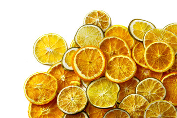 Dried slices of orange and lemon on a white