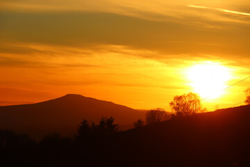 Fototapeta na wymiar Sunset over the valleys on the Wales to Herefordshire border near Ewyas Harold