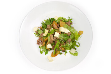 Salad with boiled duck meat, cheese, pear, greens, top view