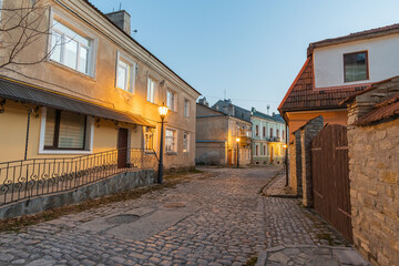 Old medieval European street. Piatnytska street, Kamyanets-Podilsky old town, Ukraine.