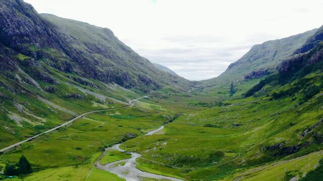 Aerial Drone Shot of Road Through the Glen Coe Hills 05. High quality video footage