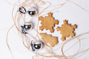 Cinnamon cookie with Christmas decoration on white background