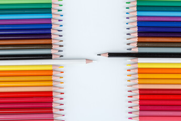 Multi-colored pencils in a row