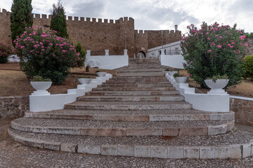 Principal door and walls of the castle of the Medieval village of Estremoz in Alentejo region in Portugal.