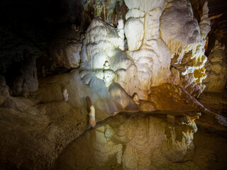Postojna cave, Slovenia. Formations inside cave with stalactites and stalagmites.