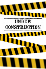 Stempelabdruck mit den Worten Under Construction als 3d gerenderte Illustration