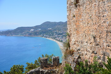 ancient brick wall on mediterranean sea background, cleopatra beach