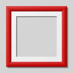 roter quadratischer Bilderrahmen an einer Wand